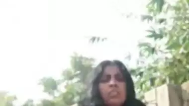 Nude desi Bhabhi bathing outdoors and enjoys video call sex